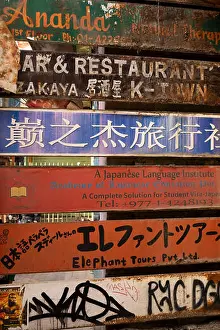 Advertisements Prints: Nepal, Kathmandu, Thamel, Jyatha, tourist signs in Hebrew, Japanese, Chinese and English