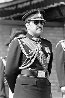 Aristocrat Prints: Nepalese King Birendra waits to receive Queen Elizabeth on her arrival for an official tour of Nepal at the Kathmandu