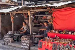 Art And Craft Prints: Nepali potter working on the pottery square in Bhaktapur