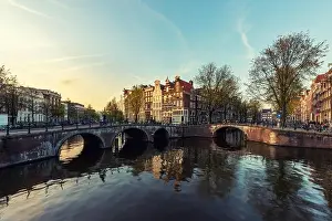 Netherlands traditional houses and Amsterdam canal in Amsterdam, Netherlands. Vintage tone