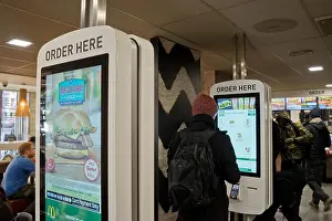 Ordering Prints: New menu ordering terminals at McDonald's fast food restaurant in Manchester.UK