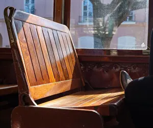 Illustrative Editorial Prints: NEW ORLEANS, LA - NOVEMBER 20, 2020: Foot resting on bench seat inside St