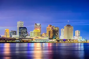 New Orleans, Louisiana, USA night skyline on the Mississippi River