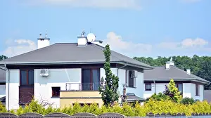 Solar Panels Prints: New single family house in a residential area in calm green neighborhood