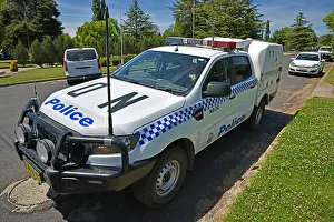 Siren Prints: New South Wales police paddy wagon on the street in Glen Innes in northern NSW, Australia