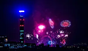 Fireworks Prints: New Year's Eve London fireworks seen from Primrose Hill London with Telecom tower in foreground