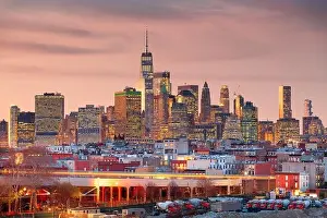 New York City, USA downtown Manhattan skyline at dusk from Brooklyn