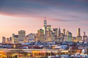 Images Dated 6th December 2017: New York City, USA midtown Manhattan skyline at dusk with Brooklyn's industrial areas in