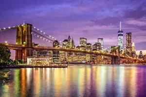 Rises Prints: New York, New York, USA city skyline with the Brooklyn Bridge and Manhattan Financial District over the East River