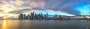 New York, New York, USA downtown Manhattan views on the East River at dusk