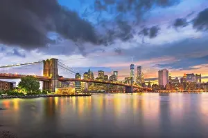 New York, New York, USA Lower Manhattan skyline on the East River at dusk