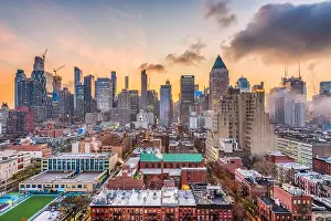 New York, New York, USA midtown Manhattan skyline over Hell's Kitchen at dawn