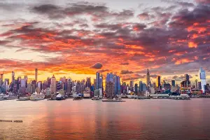 New York, New York, USA midtown skyline at dawn from the Hudson River