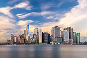 New York, New York, USA skyline on the bay at twilight from Governor's Island