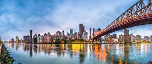 East River Prints: New York, New York, USA skyline of Manhattan from across the East River with Queensboro Bridge at dusk