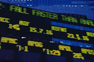 Motion Blur Prints: New York Stock Exchange Electronic Ticker in Times Square Displays Stock Information, USA