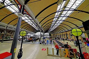 Newcastle Central Rail Station with Northern Rail local service trains and empty mainline track
