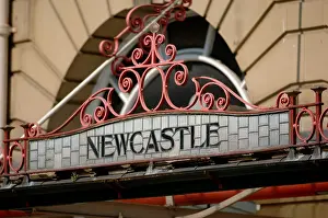 Building Construction Prints: Newcastle sign Manchester Victoria railway station