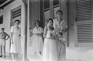 Nurses Prints: [newlyweds in hospital?. Dutch man in pajamas and Indonesian woman