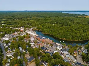 River Drone Prints: Newmarket Mills building aerial view on Lamprey River on Main Street in historic town center of Newmarket