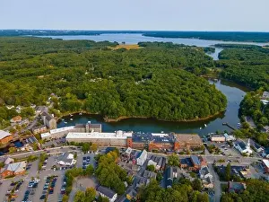 River Drone Prints: Newmarket Mills building aerial view on Lamprey River on Main Street in historic town center of Newmarket