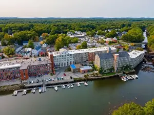 Newmarket Mills building aerial view on Lamprey River on Main Street in historic town center of Newmarket