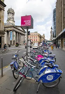 Rental Prints: Nextbike bicycles for rent lined up on a stand in Glasgow city centre