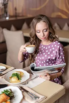 White Hand Prints: Nice woman eat breakfast in cafe