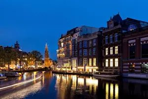 Night city view of Amsterdam, the Netherlands with Amstel river