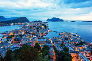 Norge Prints: Night scene of Alesund port town on western coast of Norway
