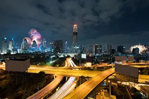 Magnolias Prints: Night view 2018 new year celebration with skyscraper in business district in Bangkok Thailand
