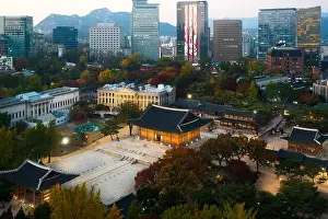 Night view of Deoksugung Palace and Seoul city in autumn season in Seoul, South Korea