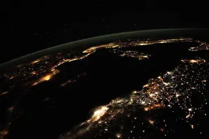 City Lights Prints: Nighttime view from the International Space Station showing the Mediterranean Sea