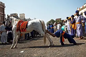 Drums Prints: Nihang or Sikh warrior showing stunts Nanded ; Maharashtra ; India NOMR