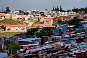 Informal Prints: The Nompumulelo informal settlement across from an upmarket housing developments
