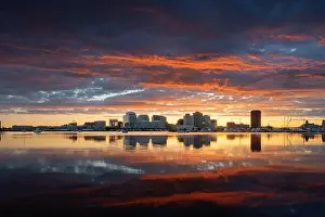 Norfolk, Virginia, USA downtown city skyline with dramatic morning clouds on the Elizabeth River