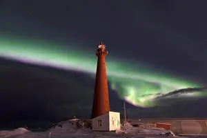 Northern Lights Prints: Northern Lights (Aurora borealis) in green and pink at Andenes Lighthouse