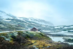 Norge Prints: Norway landscape, a small village in inclement weather snowstorm and fog in the mountains