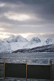 Norway Lyngen Alps snowy mountain view from boat