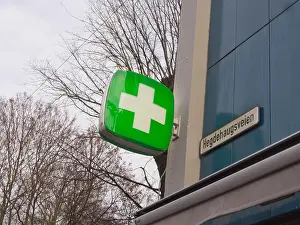 House Wall Prints: Norwegian pharmacy sign on the corner of a building