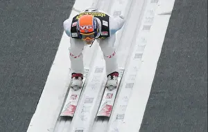 Ski Jumping Prints: Norwegian ski jumper Tom Hilde goes headlong off the bakken for his training jump at the new ski jump of