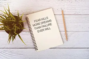 Inspirational Prints: Notepad with inspirational quotes fear kills more dreams than failure ever will