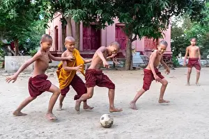 Mandalay Prints: Novice monks playing football at Buddhist monastery, Mingun, Mandalay Region, Myanmar
