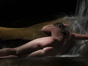 Buttock Prints: nude woman under a waterfall