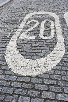 Road Markings Prints: Number 20 painted on cobbled street in London, UK