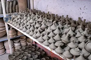 Drying Prints: Numerous handmade raw clay tajine lids