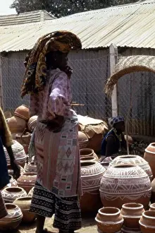 Nigeria Prints: Nupe pottery on sale in a market in Nigeria