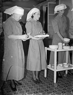 Nurses Prints: Nurses from the Nursing Auxiliaries being inspected at the Kensington Convent in London