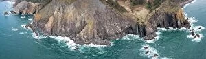Aerial Landscape Collection: The nutrient-rich Pacific Ocean meets the dramatic, rocky shoreline of Oregon, not far from Portland