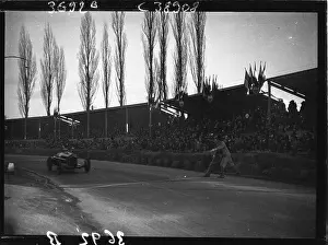 1935 Prints: Nuvolari arrives at the Grand Prix de Pau in 1935 driving an Alfa Roméo